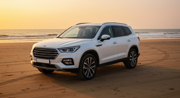 A white car parked at the beach