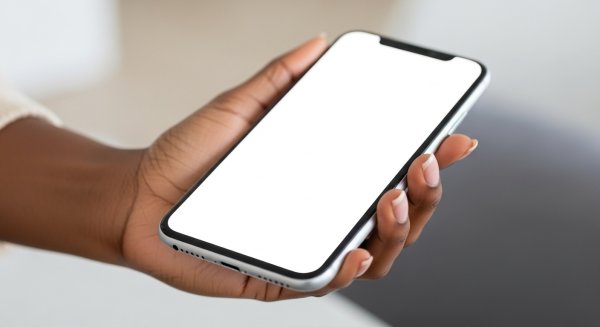 A black person's hand holding a phone mockup #2